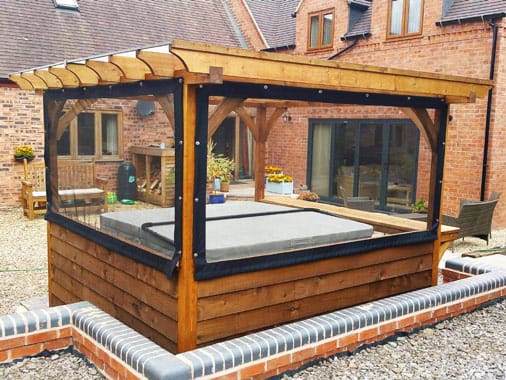 Hot tub cover with pergola style polycarbonate roof